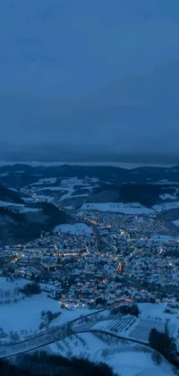Get lost in a cold, dreamy live wallpaper featuring a bird's eye view of a town