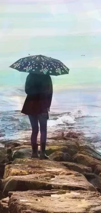 This live phone wallpaper depicts a dreamy scene of a person standing on a pier holding an umbrella