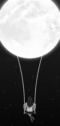 This surreal phone live wallpaper features a swing suspended in the air by a moon-shaped air balloon, with the moon itself in the background