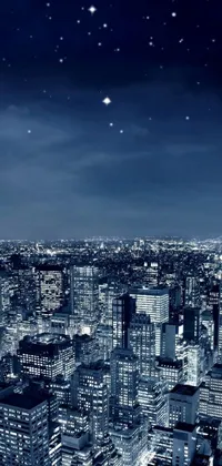 This phone live wallpaper showcases a city view at night from atop a building