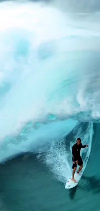 This live wallpaper features a stunning scene of a surfer riding a rolling wave on his surfboard