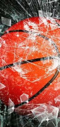 This phone live wallpaper showcases a basketball ball on a broken glass window