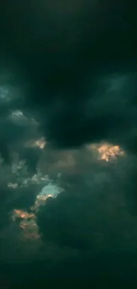 This live wallpaper showcases a plane soaring through a dark cloudy sky, set against a nebula cloud backdrop