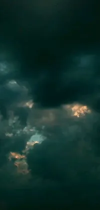 This stunning live wallpaper for your phone features a painting of a plane flying through a dark and stormy sky, with an enchanting and romantic vibe