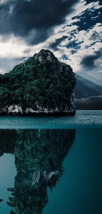 This live phone wallpaper depicts a surreal matte painting of a tropical island surrounded by water