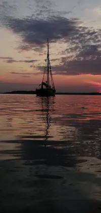 Enhance your device with this beautiful phone live wallpaper featuring a sailpunk-style boat floating serenely on a vast body of water at sunset