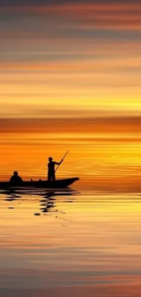 Enjoy a stunning live wallpaper on your phone featuring a couple fishing on serene waters, surrounded by an orange dawn sky