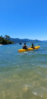 This live wallpaper showcases a yellow kayak with two riders
