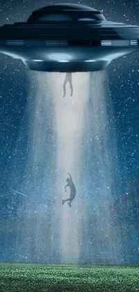 This phone live wallpaper showcases a surreal sci-fi scene where a man falls off a flying saucer while a hologram depicts the structure