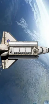 Bring the excitement of space travel to your phone with this amazing space shuttle live wallpaper
