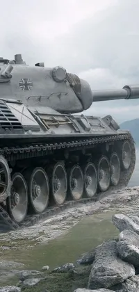 Get a stunning live wallpaper of a tank on a rocky hill during World War II in Germany