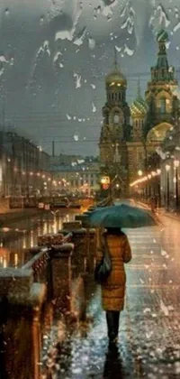 This phone live wallpaper features a stunning matte painting of a rainy cityscape with a person holding an umbrella