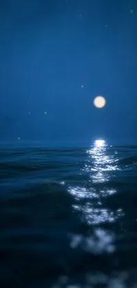 Looking for an alluring phone live wallpaper? Check out this Closeup Cinematic Aquatic Scene wallpaper featuring a boat sailing under a gleaming full moon with an ornate architectural design
