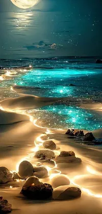 Experience the calming serenity of a picturesque beach at night with this stunning phone live wallpaper