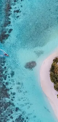 Bring the serene beauty of a small island to your phone's home screen with this captivating live wallpaper