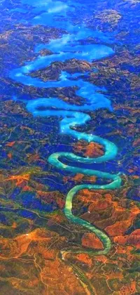 This phone live wallpaper showcases a stunning aerial view of a meandering river and picturesque land painted with impeccable detail