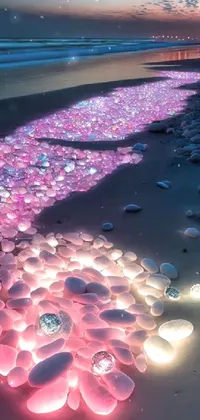 This phone live wallpaper features a mesmerizing scene of rocks piled on a beach with a jelly glow and pink diamonds