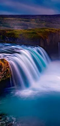 This live wallpaper boasts high quality 4k UHD resolution, HDR smooth technology, and a serene waterfall surrounded by lush greenery