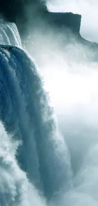 This stunning live wallpaper features a captivating scene of a surfer riding the waves in front of a waterfall