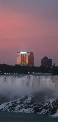 If you're seeking a mesmerizing live wallpaper for your phone, check out this image of a grand waterfall at the heart of a city