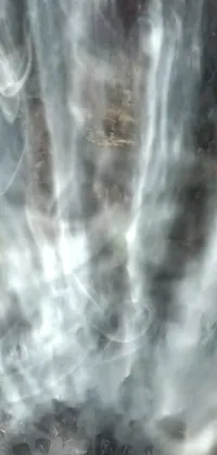 This phone live wallpaper features a detailed fire hydrant emitting smoke, waterfall, hurufiyya art style, camera view of a mysterious maw, ghostly apparitions, and an ultra-realistic glowing flame effect