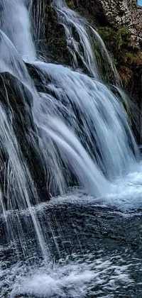 This live phone wallpaper showcases the beauty of a waterfall in stunning high-definition detail