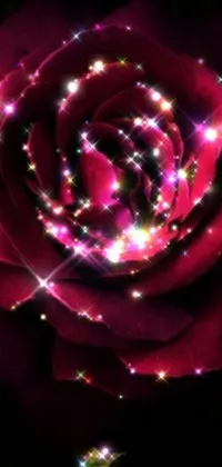 This phone live wallpaper features a mesmerizing rose that glows in the dark, with stunning digital artwork and breathtaking glittering light