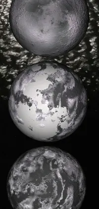 This live wallpaper features a stunning raytraced image of the moon reflecting on rippling water