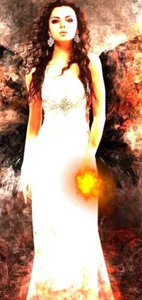 This phone live wallpaper features a striking image of a woman in a white dress standing in front of a roaring fire