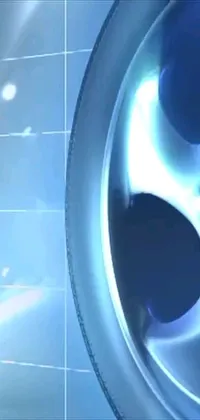 This dynamic live wallpaper showcases a vibrant blue-lit tire on a tiled floor, featuring a fiery blue flame