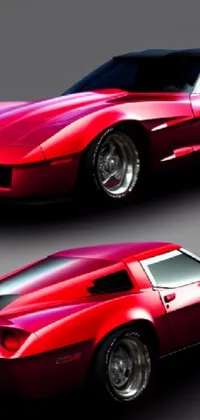 This live wallpaper boasts two red sports cars in front of a grey background