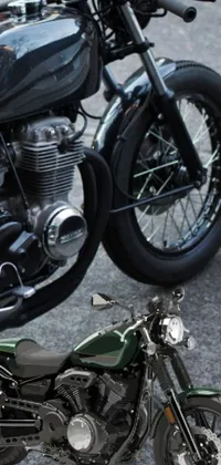 This phone live wallpaper features two sleek metallic green motorcycles parked side by side