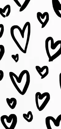 This phone live wallpaper showcases an adorable and upbeat display of black and white heart cartoons placed upon a white background