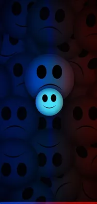 This phone live wallpaper features a colorful close-up of a cell phone with a smiley face on it