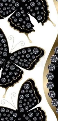 Enjoy the beauty of black and gold butterflies as they flutter on your phone's screen