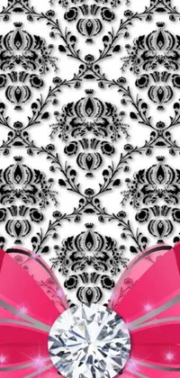 This phone live wallpaper is a stunning black and white damask pattern that comes with a bright pink bow at the center and intricate crystal jelly ornaments