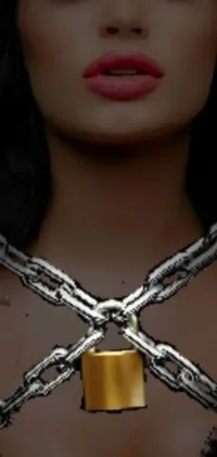Welcome to a dynamic live wallpaper for your phone! This stunning design features a captivating closeup of a woman's neck adorned with a chain, framed by a lock in the center of the image