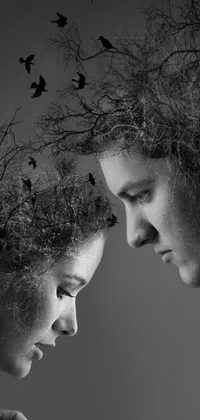 This live wallpaper features a black and white photo of a man and a woman, set against a background of grey matter and neurons