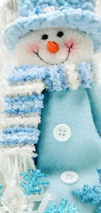 This live wallpaper showcases a delightful close-up of a snowman donning a hat and scarf in icy blue attire, perfect for the winter season