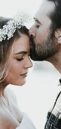 Experience the beauty of love captured in this phone live wallpaper