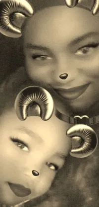 This phone live wallpaper features a monochrome photograph of a woman and child, contrasted with the bold colors of digital art rendering of Cat Woman with gold ram horns