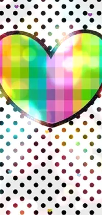This stunning Live Wallpaper features a colorful heart pulsating on a playful polka dot background