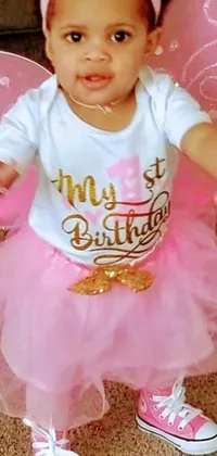 This enchanting phone live wallpaper features a cute little girl dressed as a fairy