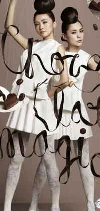 This stunning live wallpaper depicts two women standing together wearing white tights against a chocolate-colored backdrop
