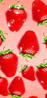 This phone live wallpaper features a stunning collection of strawberries set against a pastel pink background