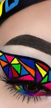 This phone live wallpaper is a stunning and colorful depiction of intricate eye makeup