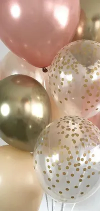 Brighten up your phone with this lively live wallpaper featuring a bunch of colorful balloons on a table