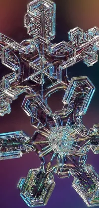 This phone live wallpaper features a hyper-realistic, microscopic photograph of a snowflake on a colorful background, rendered in crystal cubism style using the Octane Renderer