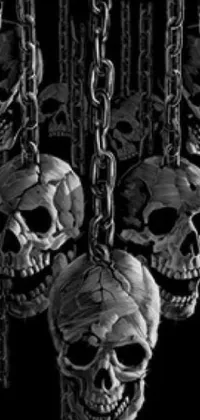 Looking for a gothic and macabre phone wallpaper that will set you apart from the rest? Check out this digital live wallpaper featuring a bunch of skulls hanging from chains