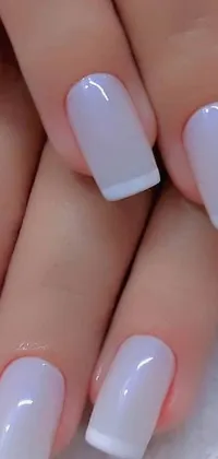 This live wallpaper features a stunning close-up of hands with a white and pink manicure